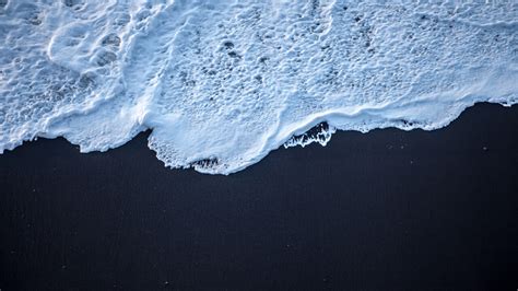 1280x720 Sea Foam Black Sand 4k 720p Hd 4k Wallpapers Images