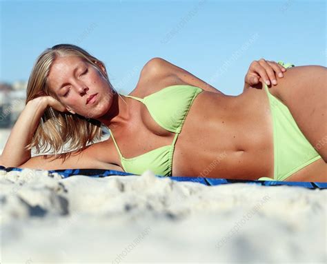 Sunbathing Woman Stock Image P Science Photo Library