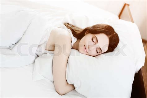 Beautiful Young Caucasian Girl Sleeping On Bed Light Lifestyle
