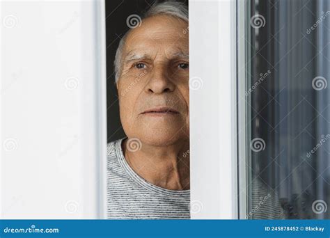 Lonely Elderly Man Looking Into The Window Stock Photo Image Of