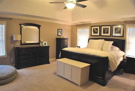 The rich black paint finish beautifully embracing the warm cottage design of the greensburg bedroom collection creates a relaxing. Master bedroom with black and tan color palette. Like this ...