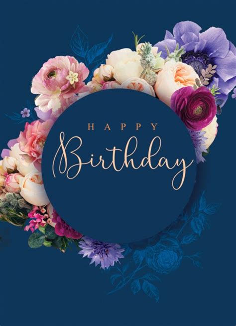 A Blue Birthday Card With Flowers And The Words Happy Birthday In Gold