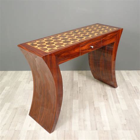 There is a wide range of designs of glass top dining tables in almost every price range. Console art deco occasion