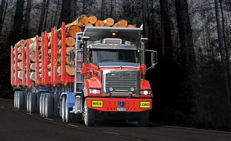 Mills-Tui trailers carrying a mighty load of logs • Mills Tui