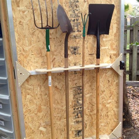 Maybe you would like to learn more about one of these? Shed door doubles as shovel storage | Small garden tools ...