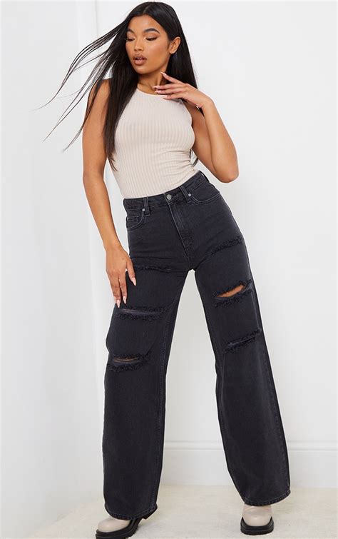 Washed Black Ripped Wide Leg Jeans Prettylittlething