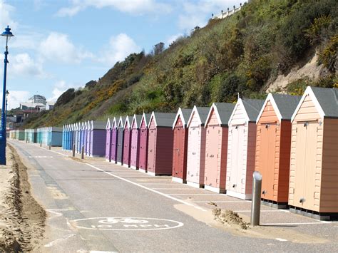The Row Of Colour Chart Beach Huts In Bournemouth Bournemouth Beach