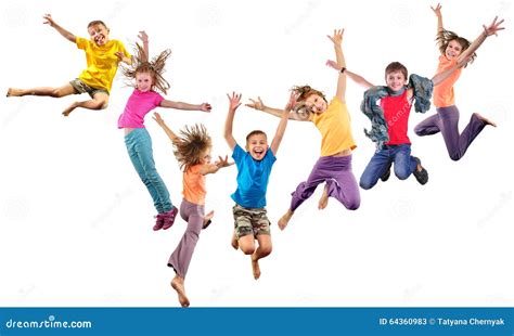 Group Of Happy Cheerful Sportive Children Jumping And Dancing Stock
