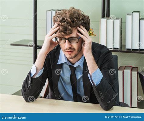 Depressed Worker Business Manger With Frustrated Expression On Office
