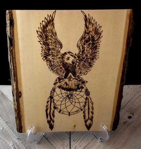 Wood Burned Untreated Basswood Wall Plaque Featuring Native American Art With An Eagle Atop A