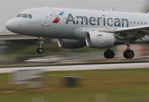 American Airlines Passenger Opens Planes Emergency Door Jumps On To Wing