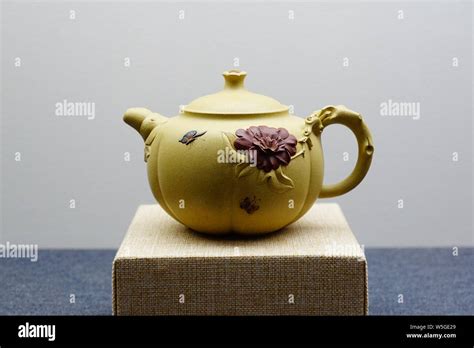 Purple Clay Teapot Works Are On Display At The Capitals Lingering