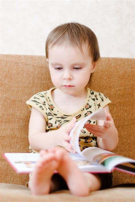 Beautiful Cute Baby Reading A Book Stock Photo Image Of Cheerful