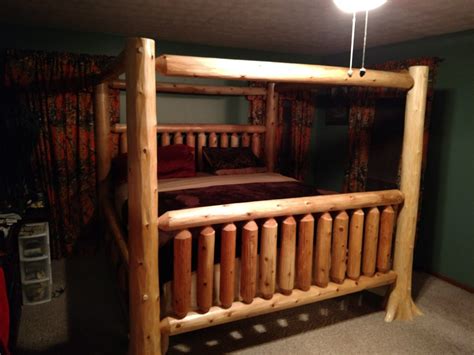 The canopy bed can fit into any bedroom style. King size log canopy bed | Log canopy bed, Log furniture ...