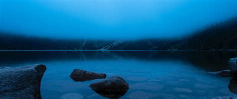 2560x1080 Morskie Oko Poln Calm Lake In The Mountains 5k 2560x1080
