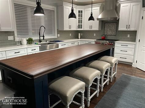 Kitchen & bath, countertop installation, cabinetry. Peruvian Walnut Kitchen Island Top in Canton, MA