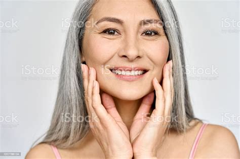 Senior Happy Middle Aged Mature Asian Woman Closeup Portrait Skin Care