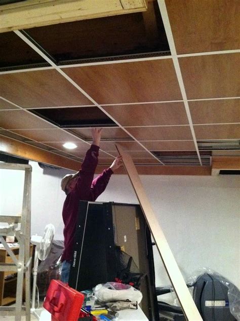 Give your basement a lift by replacing the drop ceiling with a diy beadboard ceiling. wood panel drop ceiling | Drop ceiling basement, Dropped ...