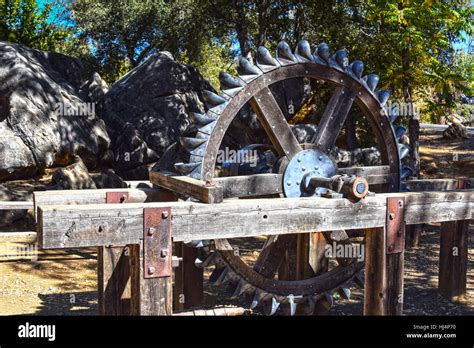 Old Wooden Water Wheel With Iron Buckets Stock Photo Alamy