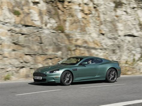 This includes a rear compartment furnished with helmet. Aston Martin DBS Racing Green photos - PhotoGallery with ...