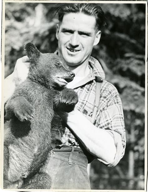 Man And Bear Cub At Chippewa Park Zoo A Man Holds A Bear Flickr