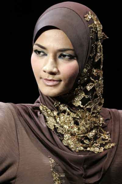 A Model Displays A Creation By Malaysian Designer Tuan Hasnah During Islamic Fashion Festival At