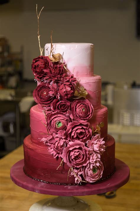 a beautiful burgundy ombre cake featured at the hotel at the kirkwood center burgundy wedding