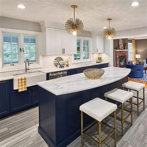 Navy And Blue Kitchen With Brass Accents And Marble Countertops By Case