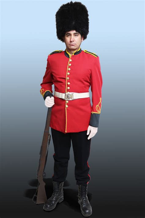 The grenadier guards uniform has equally spaced buttons, a grenade on the collar and a white plume (household division poster/victoria howard). Buckingham Palace Guard - First Scene - NZ's largest prop ...