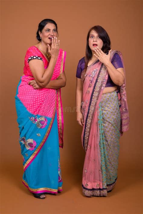 Two Mature Indian Women Looking Shocked And Surprised Stock Photo
