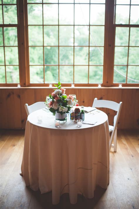 Round Sweetheart Table At Rustic Reception