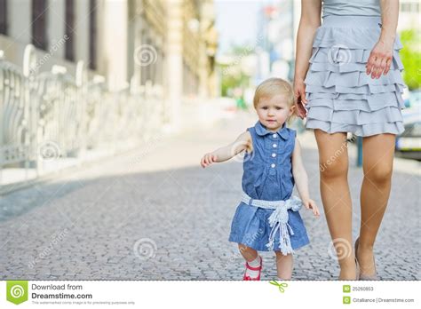 Baby With Mother Walking In City Stock Photos Image