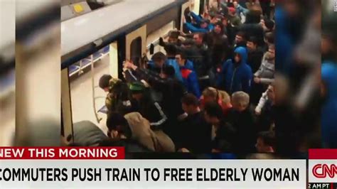 See Dozens Of Passengers Push Train To Rescue Woman Cnn Video