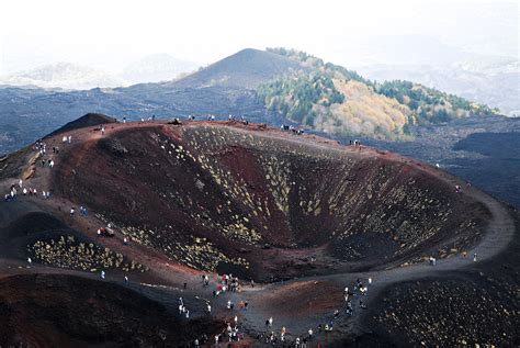 Located on sicily's east coast, it faces the ionian sea. File:Path over the volcano crater,Mount Etna. East coast ...