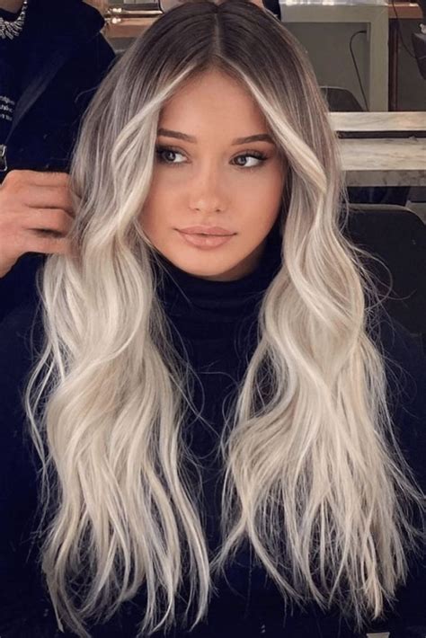 money piece hair is the latest face framing highlights trend in 2022 dark roots blonde hair