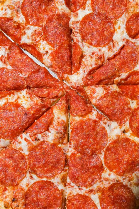Sliced Pepperoni Pizza In Close Up View · Free Stock Photo