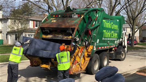 Waste Management CNG McNeilus Rear Loader Garbage Truck Packing Out On