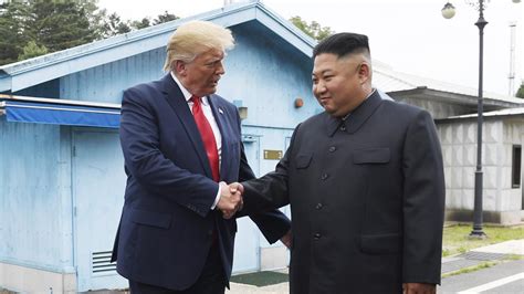 trump shakes hands with kim and crosses into north korea