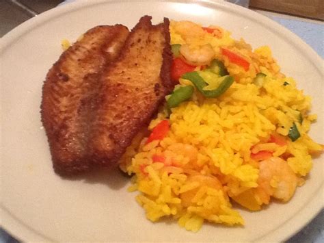 Fried Spiced Fish With Yellow Rice Healthy Eating Food Healthy