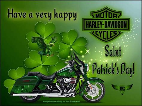 A Green Motorcycle Is Parked In Front Of Shamrock Leaves And The Words