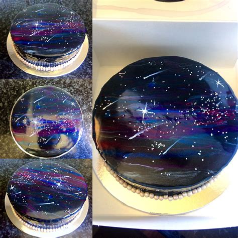 The Cake Is Decorated With Stars In The Night Sky And On Top Of Other Cakes