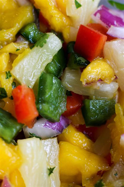 A recipe for mango salsa, which also includes pineapple, a jalapeño pepper, red onion, lime juice and cilantro. Fish Tacos with Pineapple Mango Salsa | The Culinary Compass