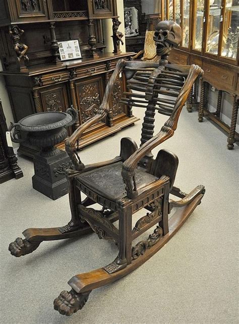 An Old Rocking Chair With Skeleton Legs And Arms