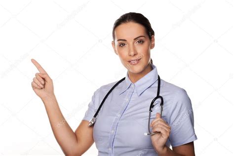 Doctor Pointing With Her Finger — Stock Photo © Nelka7812 14271065