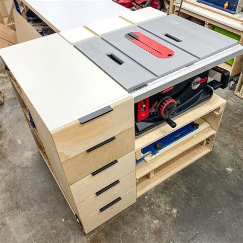 A Workbench With Drawers And Tools On It