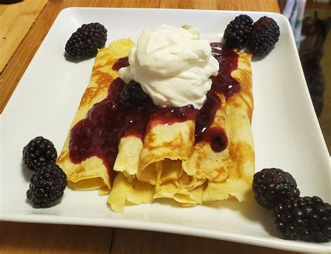 Homemade Crepes With Ginger Blackberry Compote Vanilla Whipped Cream