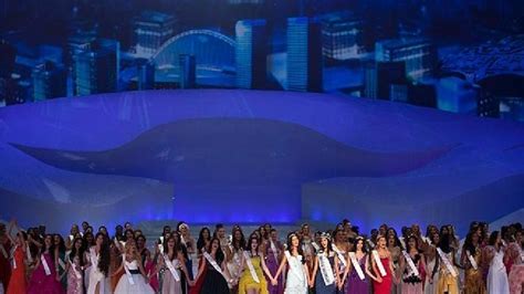 Miss World Contestants Hold Hands And Sing On Stage Following The Miss World 2012 Beauty Pageant