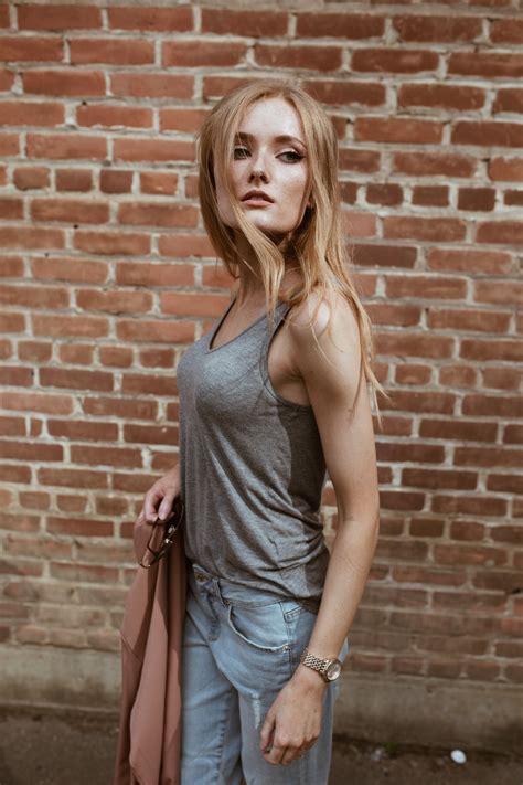 a woman wearing a grey tank top and denim jeans pixeor large collection of inspirational photos