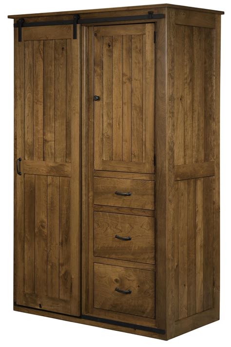 I love how bold and visulally heavy they are. Sliding Barn Door Wardrobe Cabinet from DutchCrafters