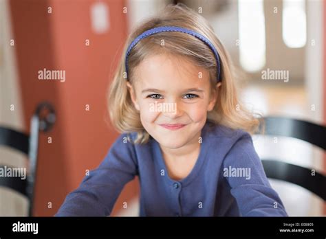 Portrait Of Smiling Cute Young Girl Stock Photo Alamy